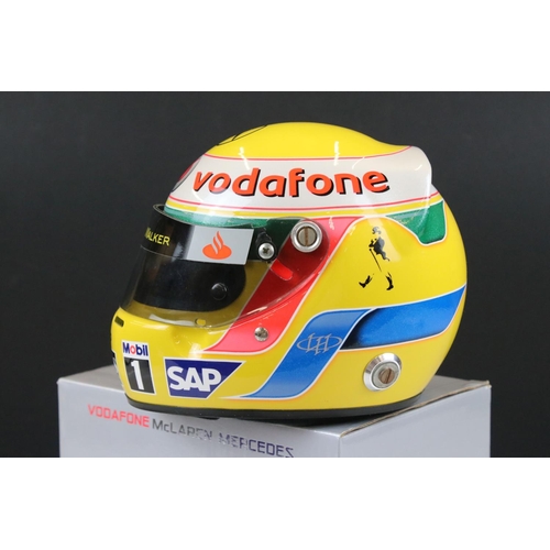 304 - A collectable half scale Vodafone McLaren Mercedes Lewis Hamilton racing helmet with original box.