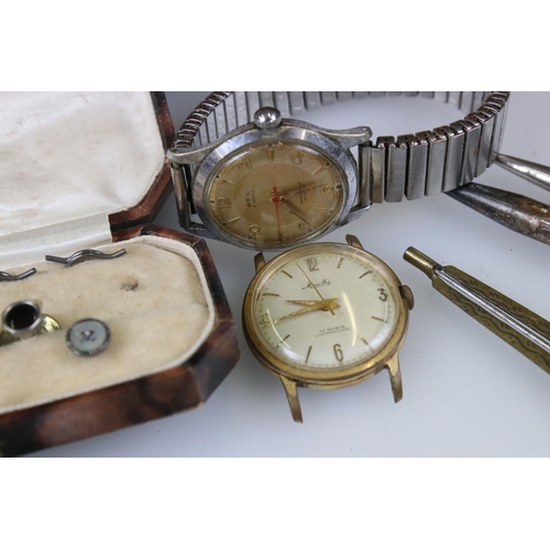 307 - A group of mixed collectables to include watches, button hook, cufflinks and studs, silk cigarette c... 