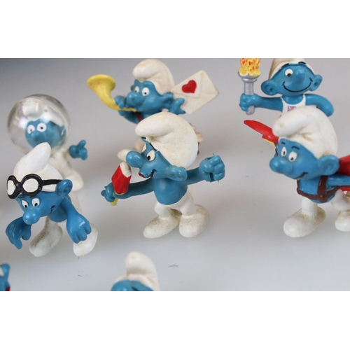 315 - A small collection of approx twelve Smurf figures.