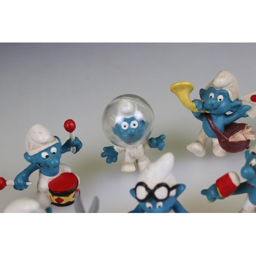 315 - A small collection of approx twelve Smurf figures.