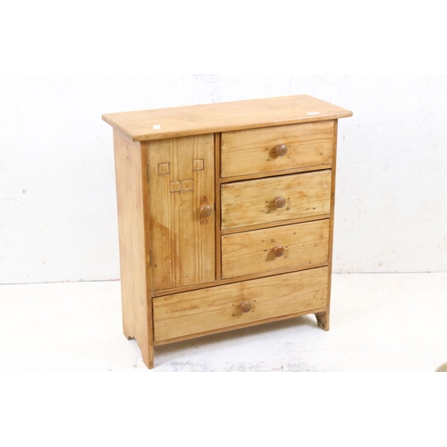 530 - A late Victorian pine unit of three short drawers and one long drawer with cupboard to the side.