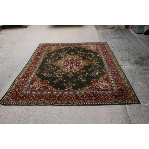 632 - Woodward Grosvenor Axminster Green Ground Rug with floral pattern, 80% wool, 366cm x 270cm