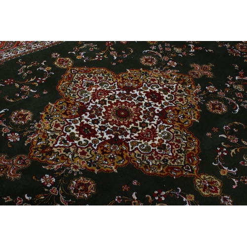 632 - Woodward Grosvenor Axminster Green Ground Rug with floral pattern, 80% wool, 366cm x 270cm