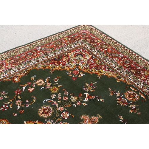 632 - Woodward Grosvenor Axminster Green Ground Rug with floral pattern, 80% wool, 366cm x 270cm