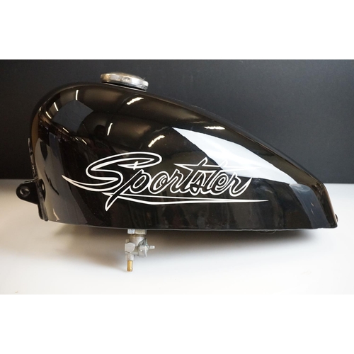 378A - A Harley Davidson Sportster petrol tank with Bettie Page decal