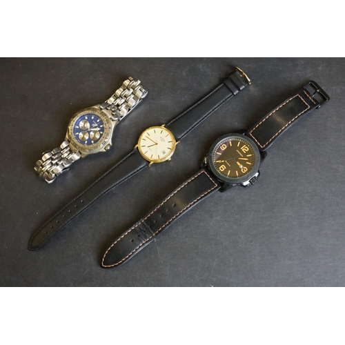 236 - A small collection of three gents watches to include Sekonda, Rotary and Fossil examples.