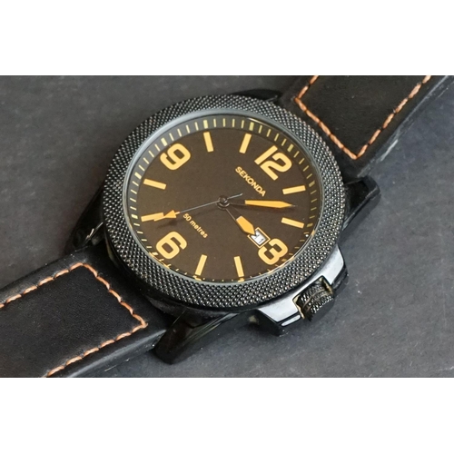236 - A small collection of three gents watches to include Sekonda, Rotary and Fossil examples.