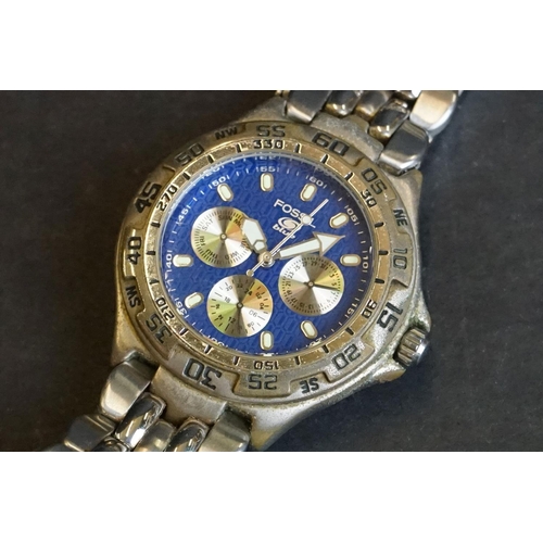 236 - A small collection of three gents watches to include Sekonda, Rotary and Fossil examples.
