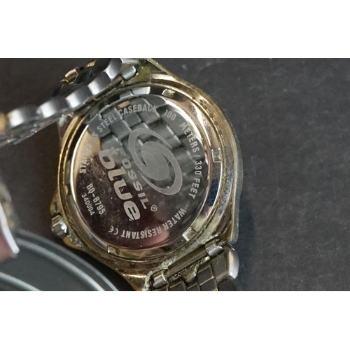 236 - A small collection of three gents watches to include Sekonda, Rotary and Fossil examples.