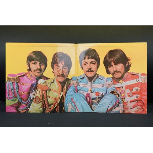 14 - Vinyl - The Beatles Sgt Pepper LP (PMC 7027) yellow and black label, including ' Gramophone Co Ltd '... 