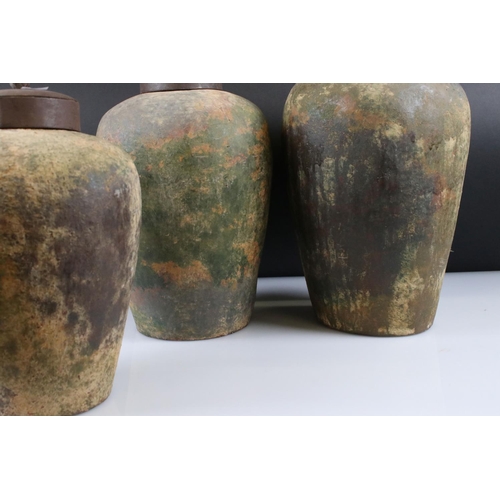 31 - Three Weathered Terracotta Urns with Metal Lids, tallest 40cm