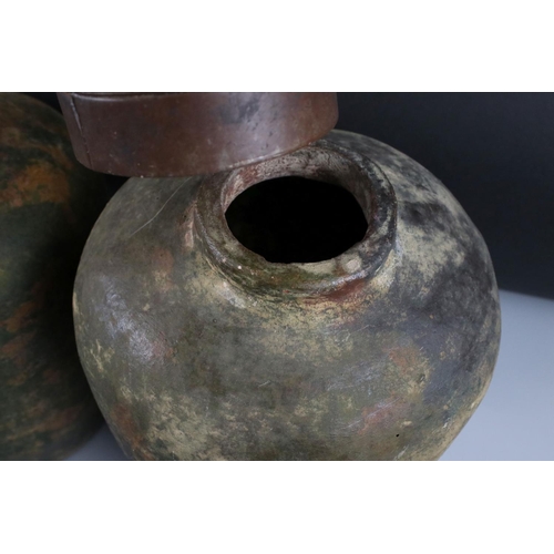 31 - Three Weathered Terracotta Urns with Metal Lids, tallest 40cm