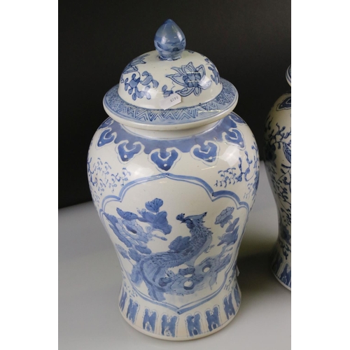 32 - Pair of 20th century Chinese Blue and White Lidded Baluster Vases, marked to base, 44cm high