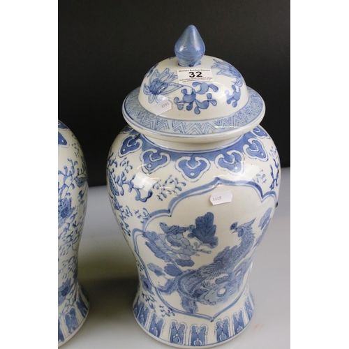 32 - Pair of 20th century Chinese Blue and White Lidded Baluster Vases, marked to base, 44cm high