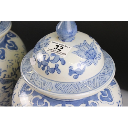 32 - Pair of 20th century Chinese Blue and White Lidded Baluster Vases, marked to base, 44cm high