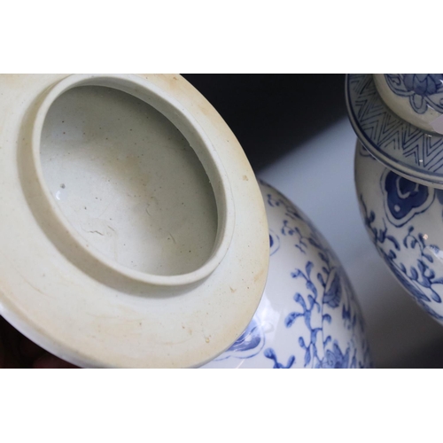 32 - Pair of 20th century Chinese Blue and White Lidded Baluster Vases, marked to base, 44cm high