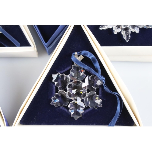 41a - Ten Boxed Swarovski Christmas / Holiday Ornaments comprising a continuous run from 1994 to 2003