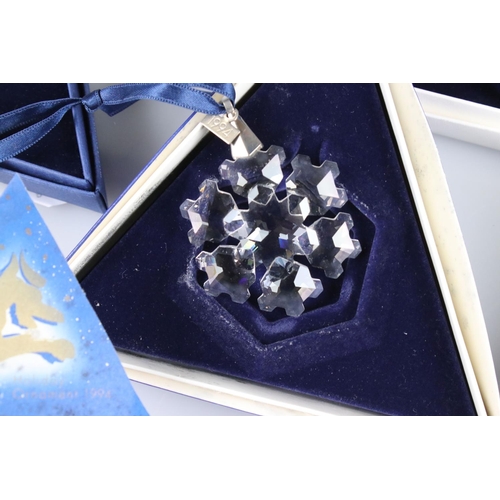 41a - Ten Boxed Swarovski Christmas / Holiday Ornaments comprising a continuous run from 1994 to 2003