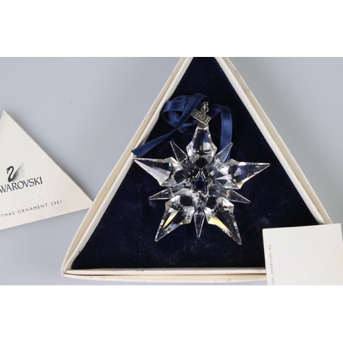 41a - Ten Boxed Swarovski Christmas / Holiday Ornaments comprising a continuous run from 1994 to 2003
