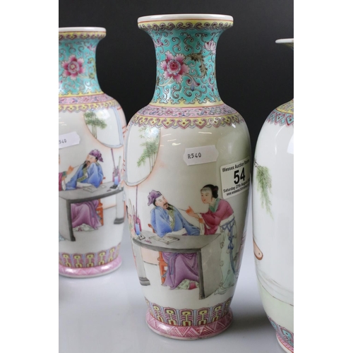 54 - Two Pairs of 20th century Chinese Famille Rose Vases, both decorated with figures and with red chara... 