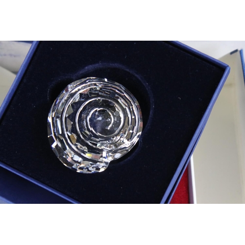 57 - Six Boxed Swarovski items including Spiral Shell, Starfish, Christmas Hear Ornament, Heart Two Daisi... 