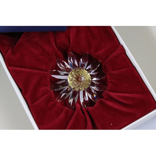 57 - Six Boxed Swarovski items including Spiral Shell, Starfish, Christmas Hear Ornament, Heart Two Daisi... 