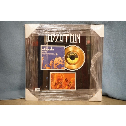 1035 - Memorabilia / Autographs - Led Zeppelin - Framed and glazed image of Robert Plant & Jimmy Page signe... 