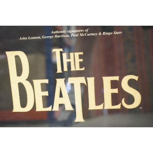 1044 - Memorabilia - Framed & glazed Beatles display featuring a piece of card bearing signatures John Lenn... 