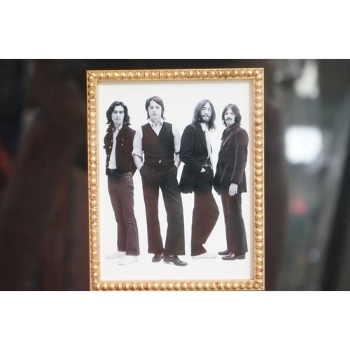 1044 - Memorabilia - Framed & glazed Beatles display featuring a piece of card bearing signatures John Lenn... 