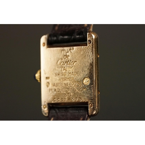 371A - Must de Cartier tank vermeil silver gilt wristwatch, cream dial with black Roman numerals and gilt b... 