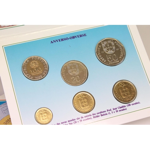 175 - A collection of ten uncirculated coin sets to include a 1982 Pobjoy Mint World Cup crown coin, 1995 ... 