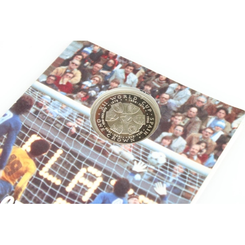 175 - A collection of ten uncirculated coin sets to include a 1982 Pobjoy Mint World Cup crown coin, 1995 ... 