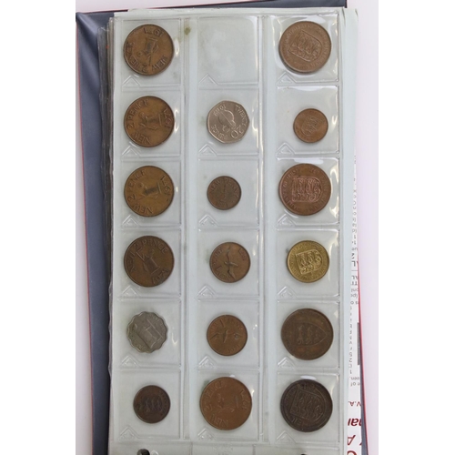 188 - A large collection of mainly foreign coins contained within three collectors albums.