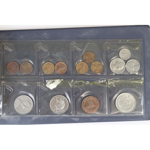 188 - A large collection of mainly foreign coins contained within three collectors albums.