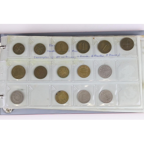 188 - A large collection of mainly foreign coins contained within three collectors albums.