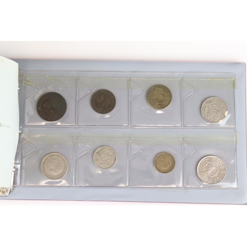 188 - A large collection of mainly foreign coins contained within three collectors albums.