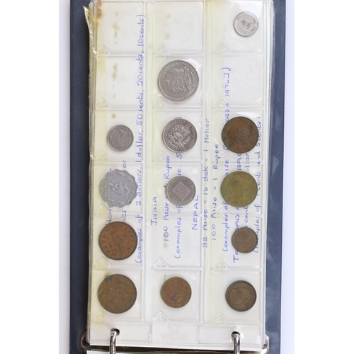 188 - A large collection of mainly foreign coins contained within three collectors albums.