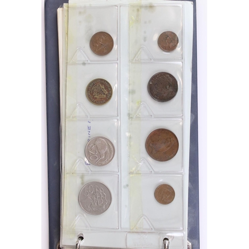 188 - A large collection of mainly foreign coins contained within three collectors albums.