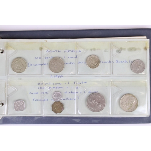 188 - A large collection of mainly foreign coins contained within three collectors albums.