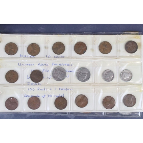 188 - A large collection of mainly foreign coins contained within three collectors albums.