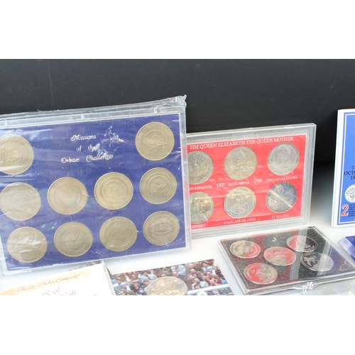 194 - A collection of mixed British and Foreign coins to include proof sets, commemorative coins...etc.