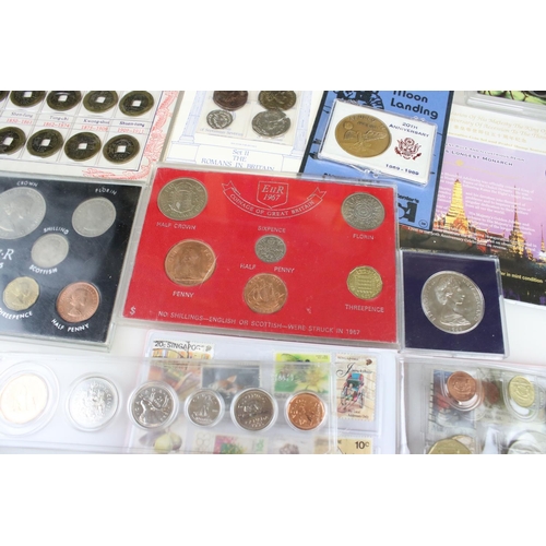 194 - A collection of mixed British and Foreign coins to include proof sets, commemorative coins...etc.