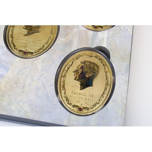 200 - A 1936 Year of the Three King coin set to include four large gold plated medallions together with a ... 