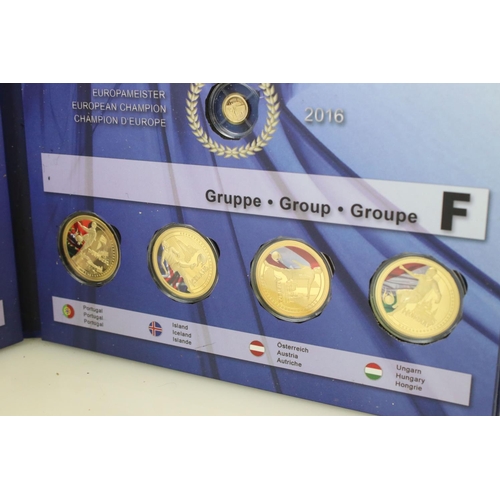 201 - A France 2016 Euro championship football coin set, comprising of twenty four gold plated coins toget... 