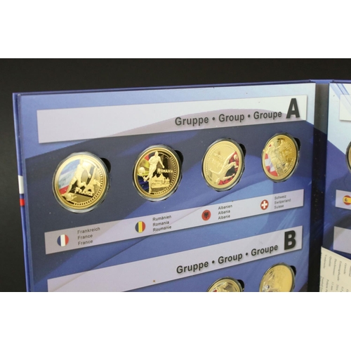 201 - A France 2016 Euro championship football coin set, comprising of twenty four gold plated coins toget... 