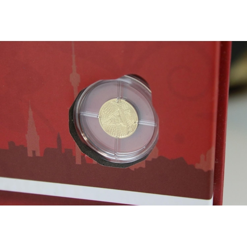 202 - A 2018 Football World Cup Participants coin set, comprising of thirty two gold plated coins together... 