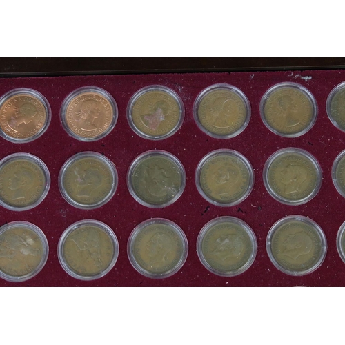 203 - A Danbury Mint 'Britannia Pennies of the Twentieth Century' coin set, from 1901-1967, all encapsulat... 