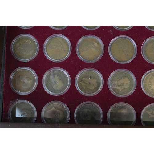 203 - A Danbury Mint 'Britannia Pennies of the Twentieth Century' coin set, from 1901-1967, all encapsulat... 