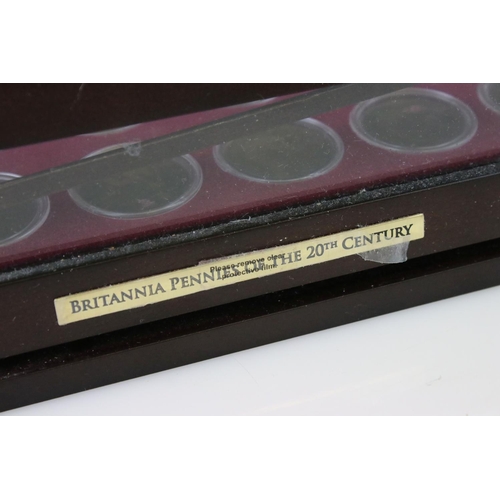 203 - A Danbury Mint 'Britannia Pennies of the Twentieth Century' coin set, from 1901-1967, all encapsulat... 