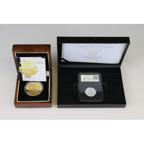 59 - A cased and slab mounted Royal Mint UK 2016 Wales fine Silver £20 coin together with a cased 2009 St... 